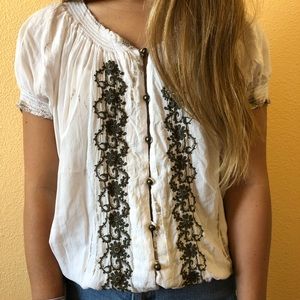 Bohemian white flowy shirt with olive details